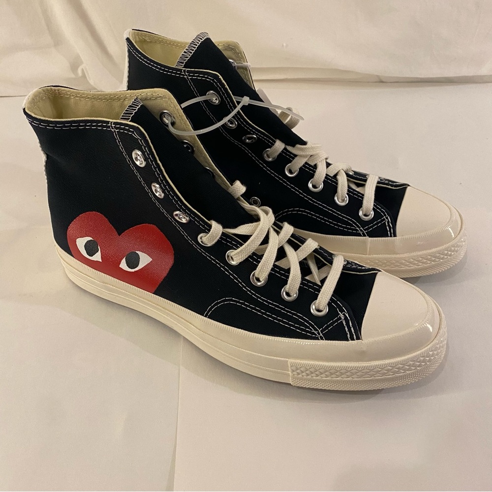 Converse Black High-Top Sneakers with Blue Star and Red Accents